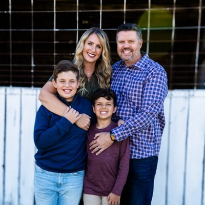 Donnie Sutton, owner of Varsity Zone HVAC of Franklin, with his family outdoors